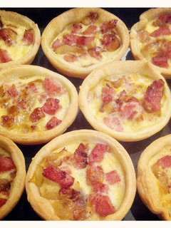 A picture of Caramelized onion & bacon mini quiche.