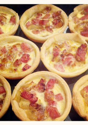 A picture of Caramelized onion & bacon mini quiche.