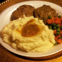 A picture of Grandma's Salisbury Steaks and Gravy.