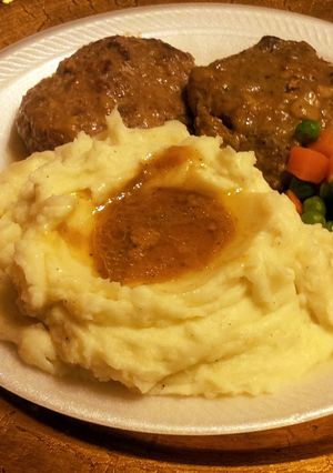 A picture of Grandma's Salisbury Steaks and Gravy.