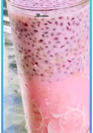 A picture of Chia milk with red syrup.