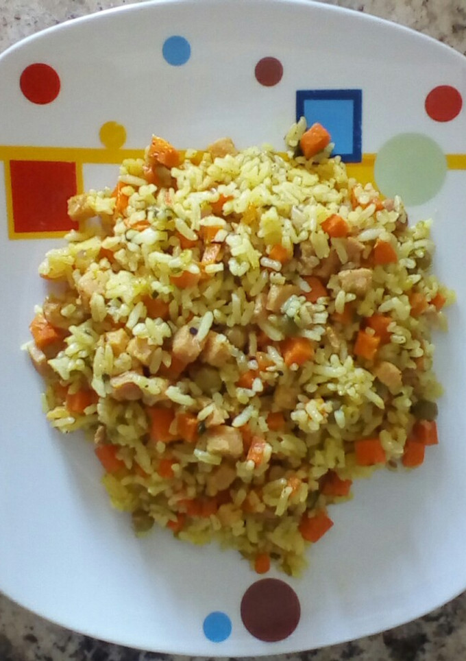 Una foto de Arroz salteado con Chuletas y Vegetales