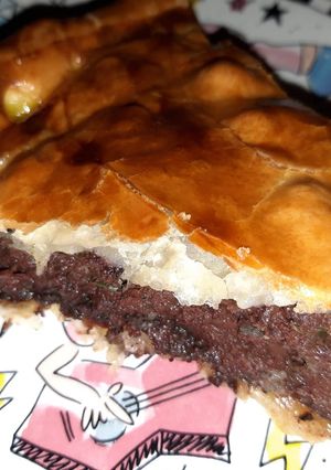 Une photo de Tourte feuilletée au boudin et à la compotée d'oignons