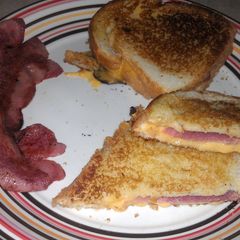 A picture of grilled cheese with Bacon.