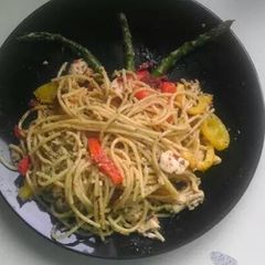 A picture of Pan fried chicken and pasta.
