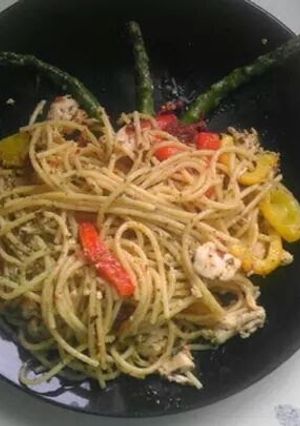 A picture of Pan fried chicken and pasta.