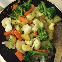 A picture of Garlic Buttered Potatoes, Broccoli And Cauliflower.