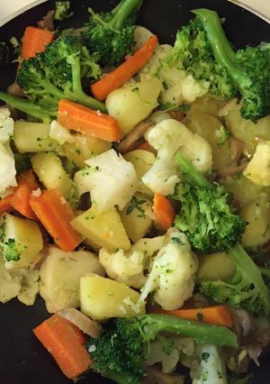 A picture of Garlic Buttered Potatoes, Broccoli And Cauliflower.