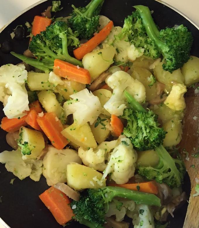A picture of Garlic Buttered Potatoes, Broccoli And Cauliflower.