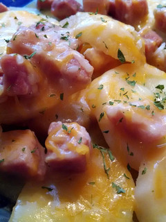 A picture of Crock pot Au Gratin Potatoes and Ham.