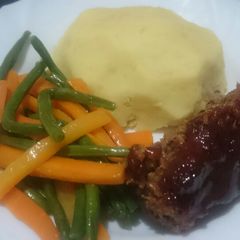 A picture of Meatloaf and mashed potatoes.