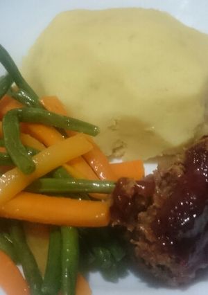 A picture of Meatloaf and mashed potatoes.