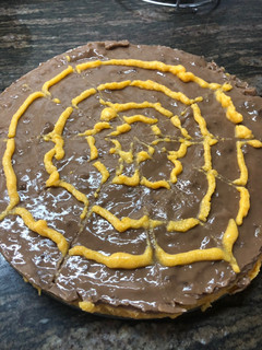 Una foto de Tarta telaraña de calabaza y chocolate fit