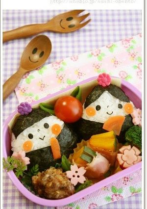 A picture of Hina Doll Rice Balls for Hinamatsuri.
