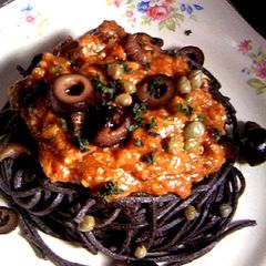 A picture of Pasta alla Puttanesca with Handmade Black Pasta.