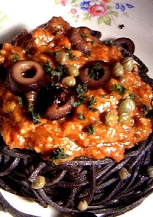 A picture of Pasta alla Puttanesca with Handmade Black Pasta.