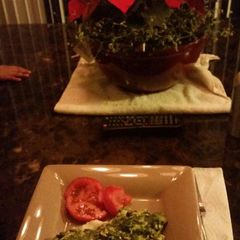 A picture of Chicken florentine w / garlic mashed potatoes.