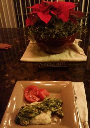 A picture of Chicken florentine w / garlic mashed potatoes.