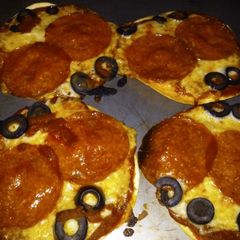A picture of Cookie's Thin Crust Tortilla Pepperoni & Cheese Pizza.