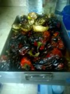 Una foto de Parrillada de pimientos berenjenas patatas y cebollas