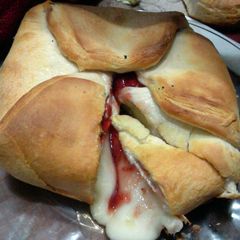 A picture of bread wrapped brie.