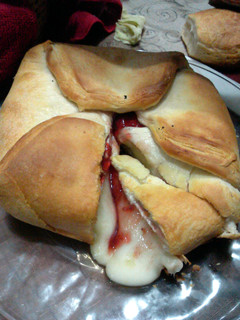 A picture of bread wrapped brie.