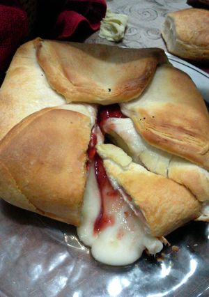A picture of bread wrapped brie.