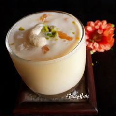 A picture of Orange-Cashwenuts Lassi.