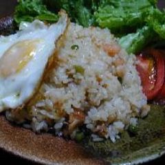 Indonesian Fried Rice with Chicken and Shrimp (Nasi Goreng) A picture of Indonesian Fried Rice with Chicken and Shrimp (Nasi Goreng).