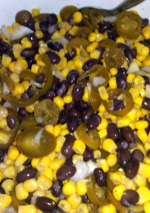 A picture of black bean & corn dip w/ jalapenos.