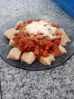 Una foto de Ñoquis de papa y zanahoria c/ Bolognesa