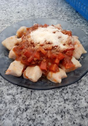 Una foto de Ñoquis de papa y zanahoria c/ Bolognesa