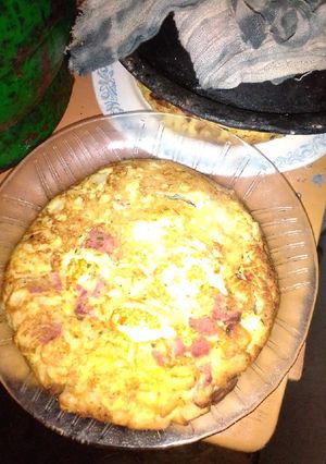 Una foto de Tortilla de papa cocida rellena