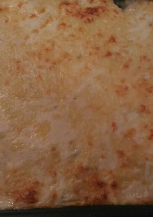 Una foto de Gratinado de patatas, jamón York y balcón