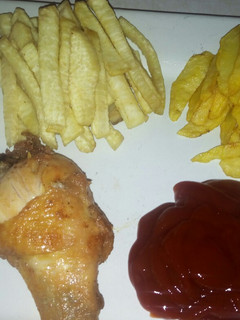 A picture of Chicken and chips.