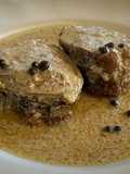 Solomillo de cerdo a la pimienta verde en leche de coco