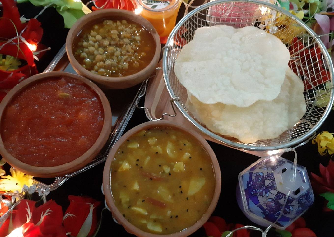 Aloo ki takari, choley ka salan, suji ka halwa and puri