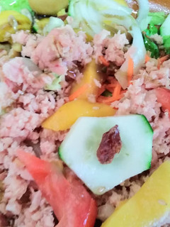 Una foto de Ensalada con mango y frutos secos