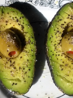 A picture of Avocado w/ olive juice.