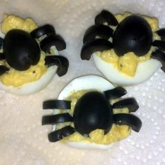 A picture of Creepy crawly deviled eggs.