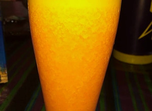 Una foto de Jugo de naranja, zanahoria y jengibre