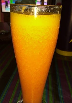 Una foto de Jugo de naranja, zanahoria y jengibre