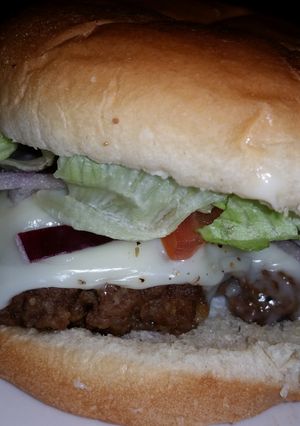 A picture of loaded burgers.