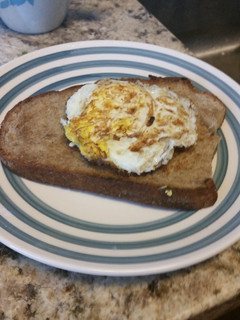 A picture of Fried eggs and toast.