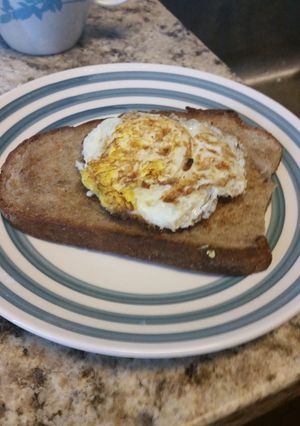 A picture of Fried eggs and toast.