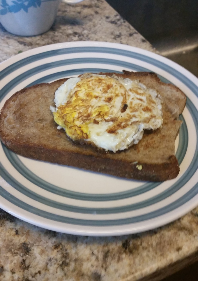 A picture of Fried eggs and toast.
