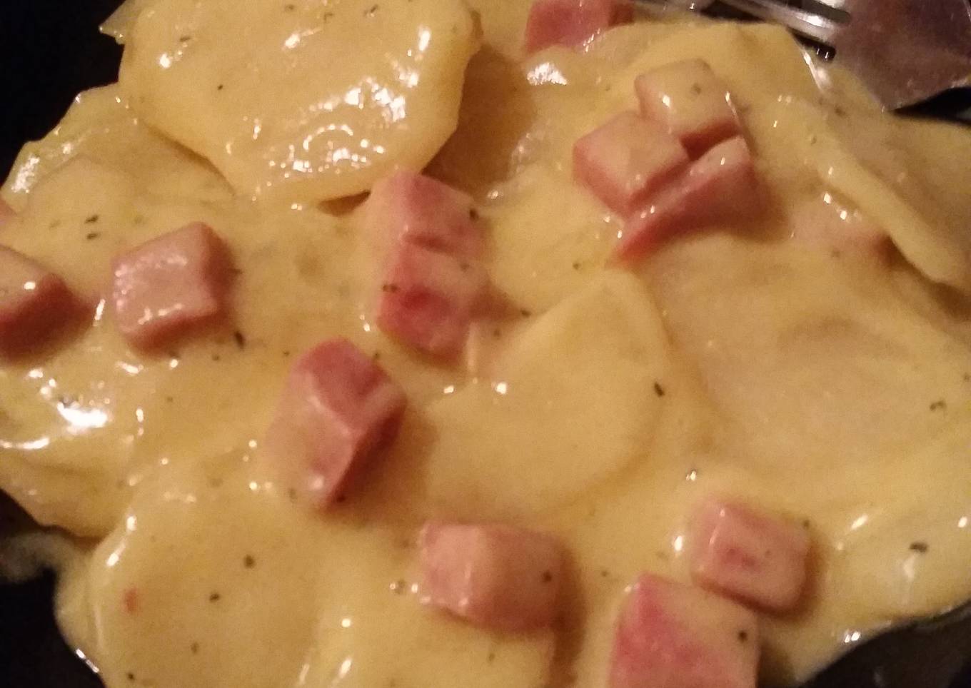 Baked potatoes and bacon with cheese