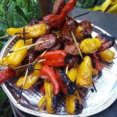 A picture of Pepper and sausage kabobs.