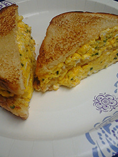 A picture of Egg and chives sandwich.