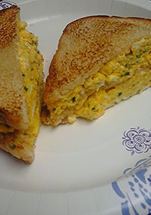 A picture of Egg and chives sandwich.